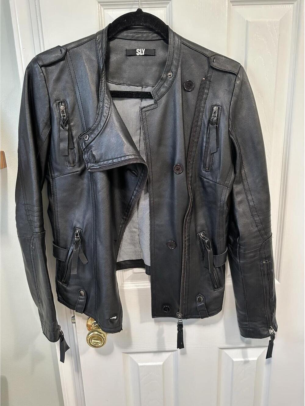 Women black real leather jacket fits Like Small